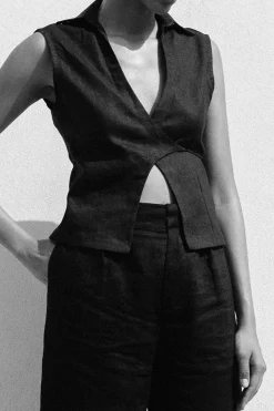 Shop FAITHFULL THE BRAND ANTIBES SLEEVELESS WRAP SHIRT Black
